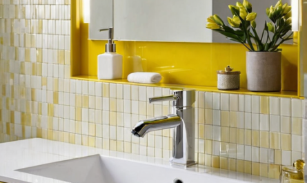 bathroom backsplasheswhite glass tiles behind a yellow bathroom sink 1